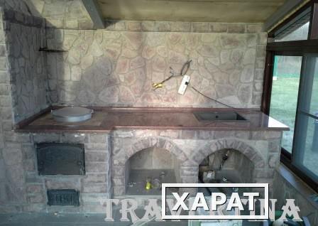 Фото Кухонная столешница и стеновая панель из искусственного камня.