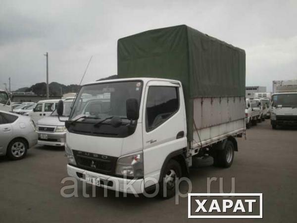 Фото Грузовик бортовой тентованный MITSUBISHI CANTER кузов FB70B гв 2010 грузопод 1,5 тн пробег 76 т.км