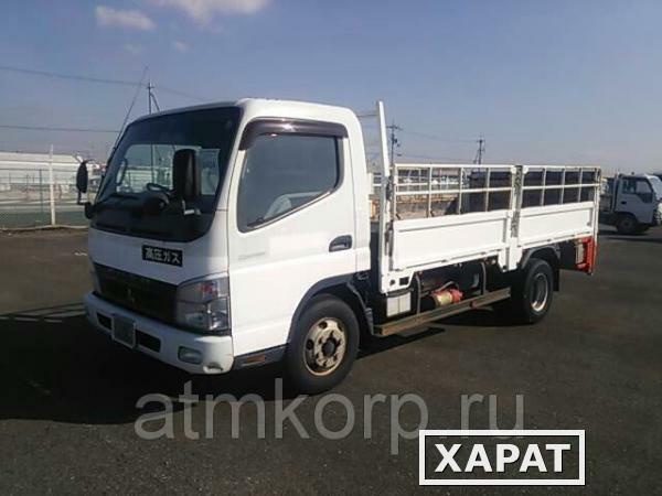 Фото Грузовик бортовой MITSUBISHI CANTER кузов FE83DY гв 2010 гидроборт грузопод 4,25 тн пробег 207 т.км