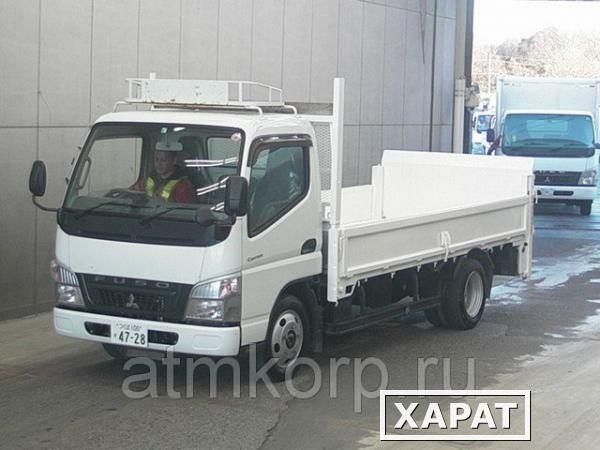 Фото Грузовик бортовой MITSUBISHI CANTER кузов FE72B гв 2010 гидроборт багажник груз 2 тн пробег 16 т.км