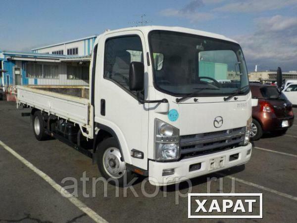 Фото Грузовик бортовой MAZDA TITAN кузов LNR85AR год выпуска 2011 грузоподъемность 2 тонны пробег 91 тыс км