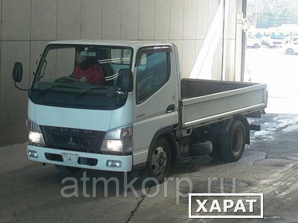 Фото Грузовик бортовой MITSUBISHI CANTER кузов FE70BS год выпуска 2009 грузоподъемность 2 тонны пробег 200 т.км