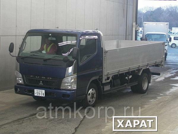 Фото Грузовик бортовой MITSUBISHI CANTER кузов FE82BS год выпуска 2010 грузоподъемность 1,75 тонны пробег 87 тыс км