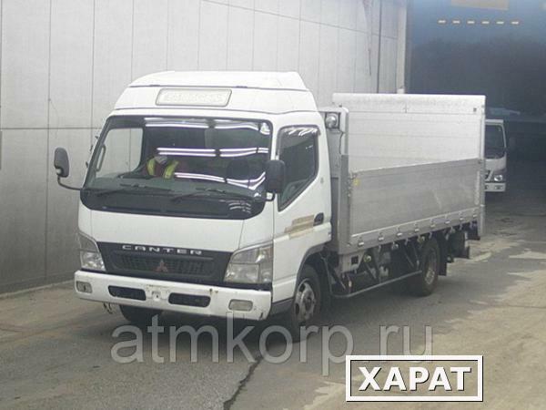 Фото Грузовик бортовой MITSUBISHI CANTER кузов FE82D гв 2009 гидроборт грузопод 3 тн пробег 199 т.км