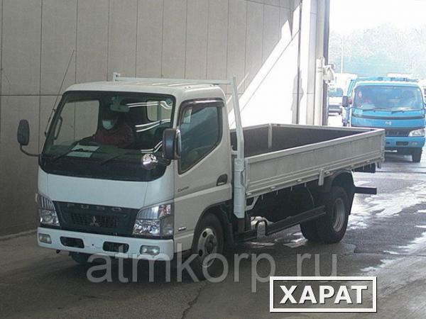 Фото Грузовик бортовой MITSUBISHI CANTER кузов FE74DV год выпуска 2010 грузоподъемность 3 тонны пробег 423 тыс км