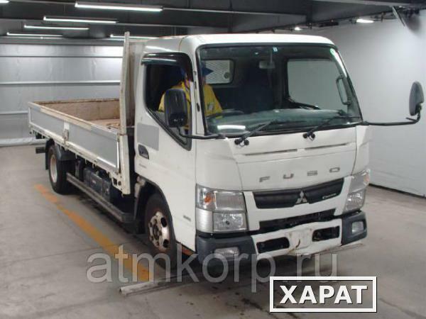 Фото Грузовик бортовой MITSUBISHI CANTER кузов FEA20 год выпуска 2012 грузоподъемность 2 тонны пробег 93 тыс км