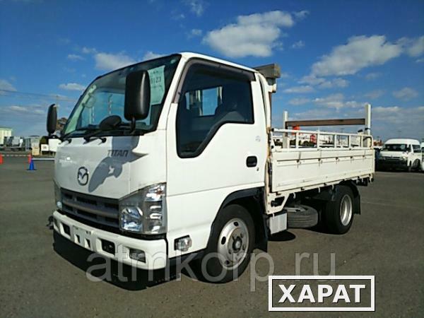 Фото Грузовик бортовой MAZDA TITAN кузов LKR85A год выпуска 2012 грузоподъемность 3 тонны пробег 112 тыс км