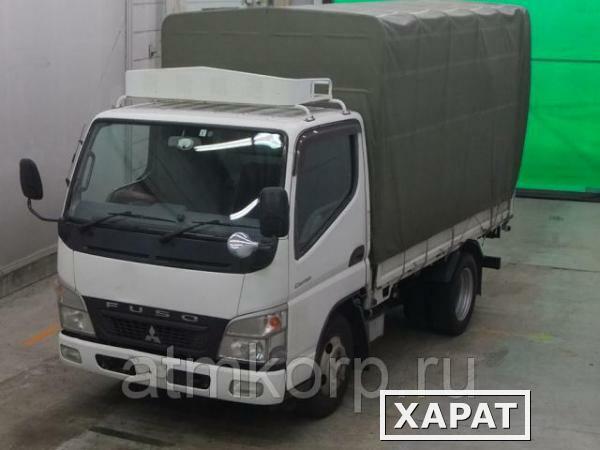 Фото Грузовик бортовой тентованный MITSUBISHI CANTER кузов FE70D гв 2009 багажник груз 2 тн пробег 341 т.км