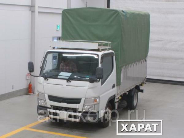 Фото Грузовик бортовой тентованный MITSUBISHI CANTER кузов FBA20 гв 2013 багажник грузопод 2 тн пробег 206 т.км