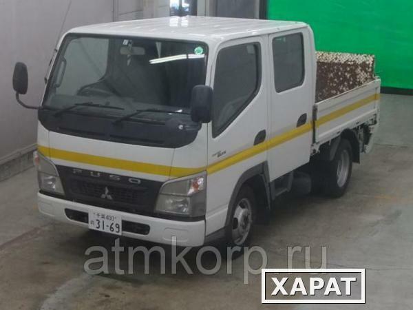 Фото Грузовик двухкабинник бортовой MITSUBISHI CANTER гв 2009 гидроборт кабина 6 м борт груз 1,25 т пробег 142 т.км