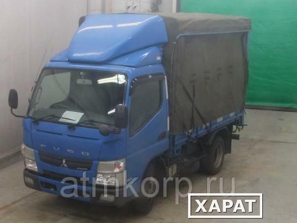 Фото Грузовик бортовой тентованный MITSUBISHI CANTER кузов FEA50 год выпуска 2012 грузопод 2 тн пробег 384 т.км