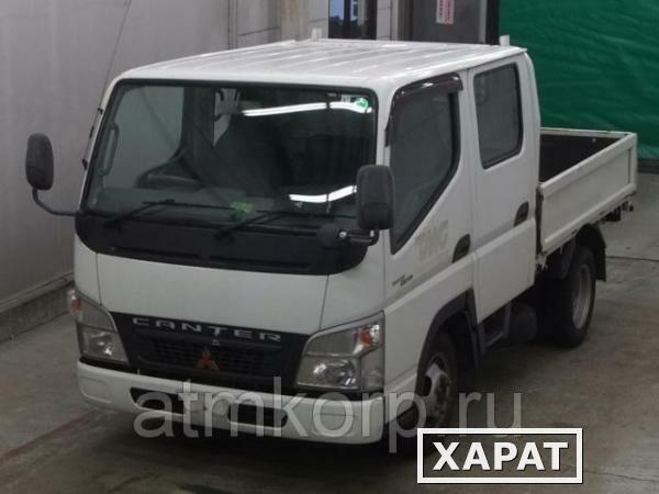 Фото Грузовик двухкабинник бортовой MITSUBISHI CANTER кузов FB70B гв 2010 кабина 6 м груз 1,25 т пробег 192 т.км