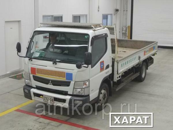 Фото Грузовик бортовой MITSUBISHI CANTER кузов FEB90 гв 2012 багажник грузоподъемность 4 тн пробег 113 тыс км