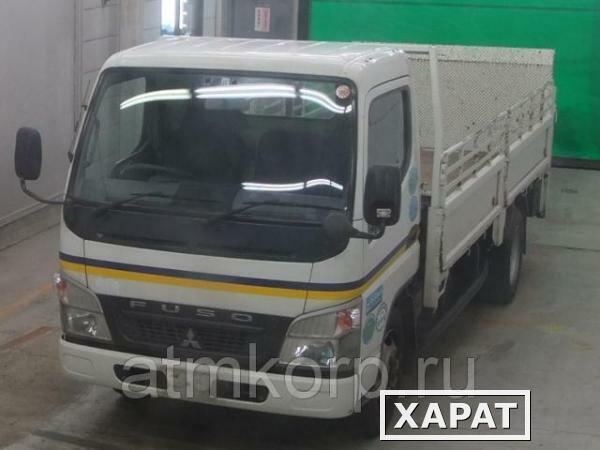 Фото Грузовик бортовой MITSUBISHI CANTER кузов FE72D гв 2009 гидроборт грузопод 3 тн пробег 239 т.км