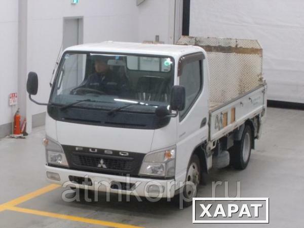 Фото Грузовик бортовой MITSUBISHI CANTER кузов FE70D гв 2010 гидроборт грузопод 2 тн пробег 129 т.км