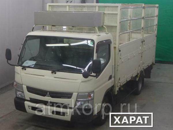 Фото Грузовик бортовой MITSUBISHI CANTER кузов FEB50 гв 2011 багажник грузопод 2 тн пробег 105 т.км