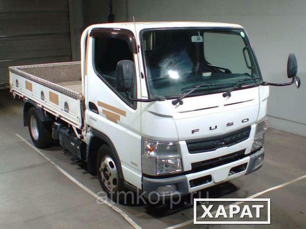 Фото Грузовик бортовой MITSUBISHI CANTER кузов FBA20 год выпуска 2011 грузоподъемность 2 тонны пробег 321 тыс км