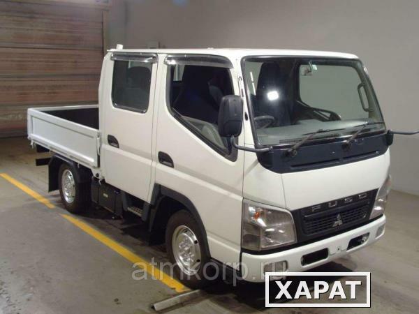 Фото Грузовик двухкабинник бортовой MITSUBISHI CANTER гв 2009 полный привод 4х4 груз 1,2 тн пробег 160 т.км