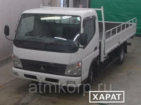 Фото Грузовик бортовой MITSUBISHI CANTER кузов FE82B год выпуска 2010 грузоподъемность 3 тонны пробег 154 тыс км