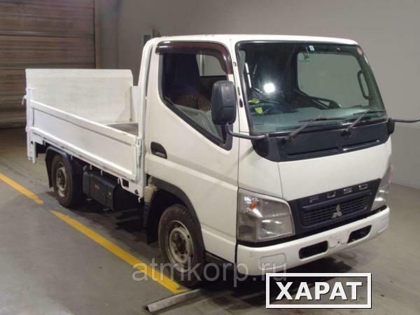 Фото Грузовик бортовой MITSUBISHI CANTER кузов FD70B гв2010 гидроборт полный привод 4х4 груз 1,5 тн пробег 62 т.км