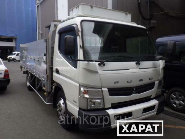 Фото Грузовик бортовой MITSUBISHI CANTER кузов FEB90 гв 2014 багажник грузоподъемность 4,3 тн пробег 92 т.км