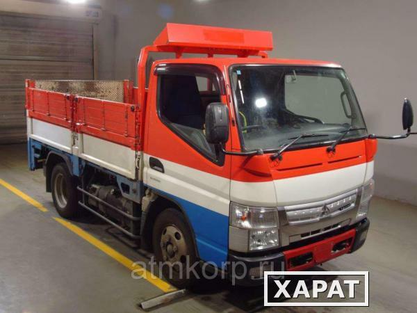 Фото Грузовик бортовой MITSUBISHI CANTER кузов FEA50 гв 2012 гидроборт грузопод 3 тн пробег 103 т.км