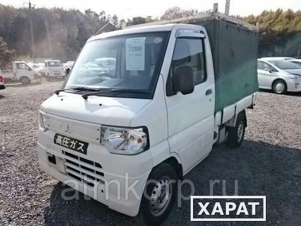 Фото Микрогрузовик бортовой тентованный MITSUBISHI MINICAB TRUCK кузов U61T гв 2012 груз 0,35 тн пробег 77 т.км