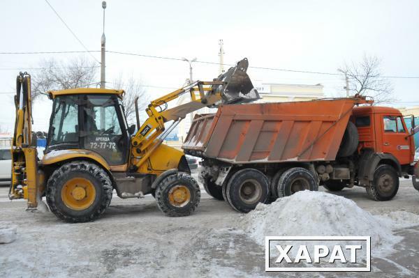 Фото Погрузка снега. Фронтальные погрузчики