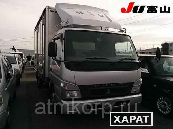 Фото Автофургон изотермический MITSUBISHI CANTER гв 2010 груз 2 т двухсторонняя разгрузка пробег 264 т.км