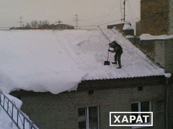 Фото Чистка снега с крыш. Удаление сосулек и наледи