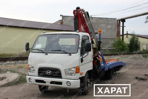 Фото Hyundai HD 78 Эвакуатор с КМУ Fassi 100AT ломаная платформа