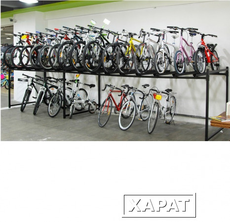 Фото Стеллаж двухьярусый для хранения велосипедов на складе или в магазине на 12 мест