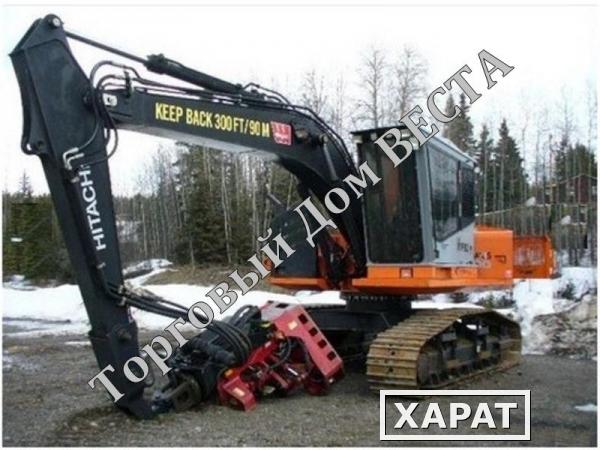 Фото Hitachi zx200 LL с харвестерной головкой 2006 года.