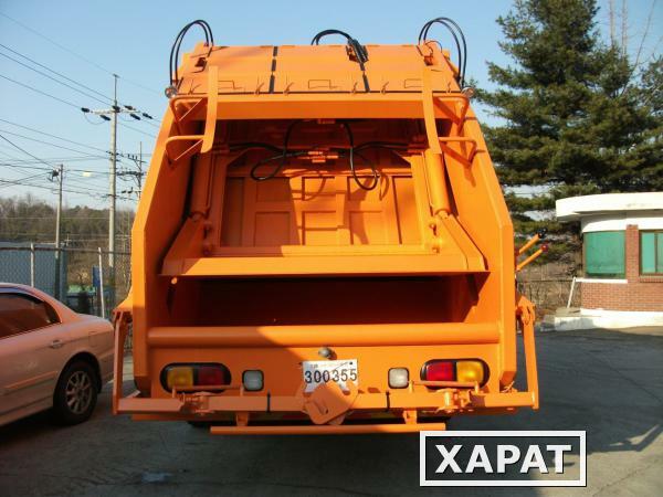Фото Мусоровоз 20m3 на базе грузовика Hyundai mega truck евро 5 с автоматическим захватом мусорного бака.
