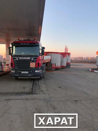 Фото Перевозка крупногабаритных грузов на тралах Scania