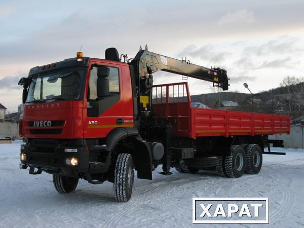 Фото Сдам в аренду тягач Iveco Trakker с п/прицепом с КМУ (гр/п 20 т