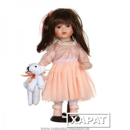 Фото Фарфоровая кукла эрика с мягконабивным туловищем высота 30 см.