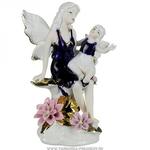 фото Статуэтка ангел с ребёнком на цветке высота 18 см,