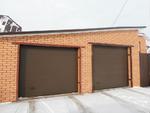 фото Автоматические секционные ворота для дома (гаража)