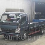 фото Грузовик бортовой MITSUBISHI CANTER кузов FE83DY гв 2009 багажник грузопод 4 тн пробег 43 т.км