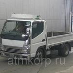 фото Грузовик бортовой MITSUBISHI CANTER кузов FE70B гв 2010 багажник грузоподъемность 2 тн пробег 278 т.км