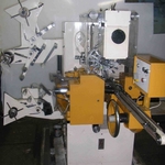 фото Заверточная машина EU-7 нагема nagema для завёртки конфет в двухсторонний перекрут