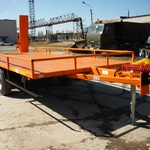 Фото №4 Низкорамный грузовой прицеп для перевозки дорожно строительной техники до 7000 кг.