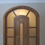 фото Арочные межкомнатные двери из массива ясеня с багетом